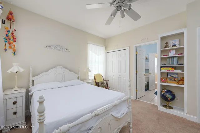 a outdoor space with a large window and couch