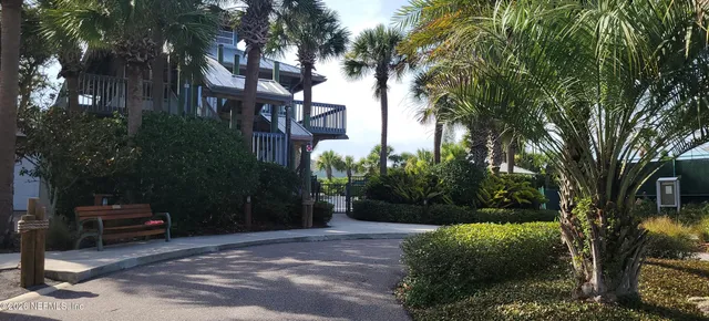 a swimming pool with outdoor seating and yard