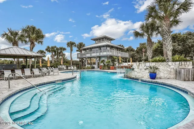 a view of balcony with a flower garden