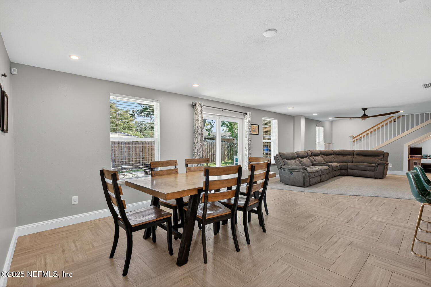 214 Deltona Boulevard St. Augustine, FL 32086 - Photo 14 of 23 a view of a dining room with furniture and a livingroom