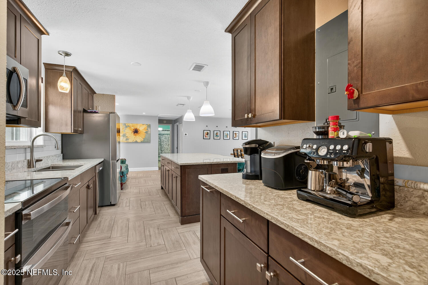 214 Deltona Boulevard St. Augustine, FL 32086 - Photo 16 of 23 a kitchen with sink cabinets and stove top oven