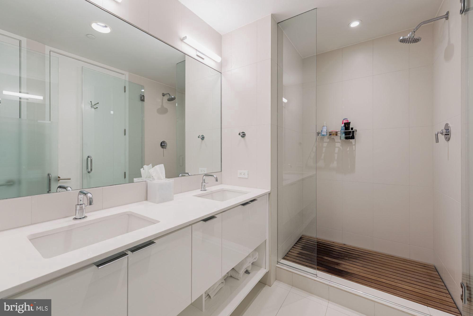 1111 24th Street Northwest, Unit 22 Washington, DC 20037 - Photo 10 of 17 Owners Bath with dual sinks