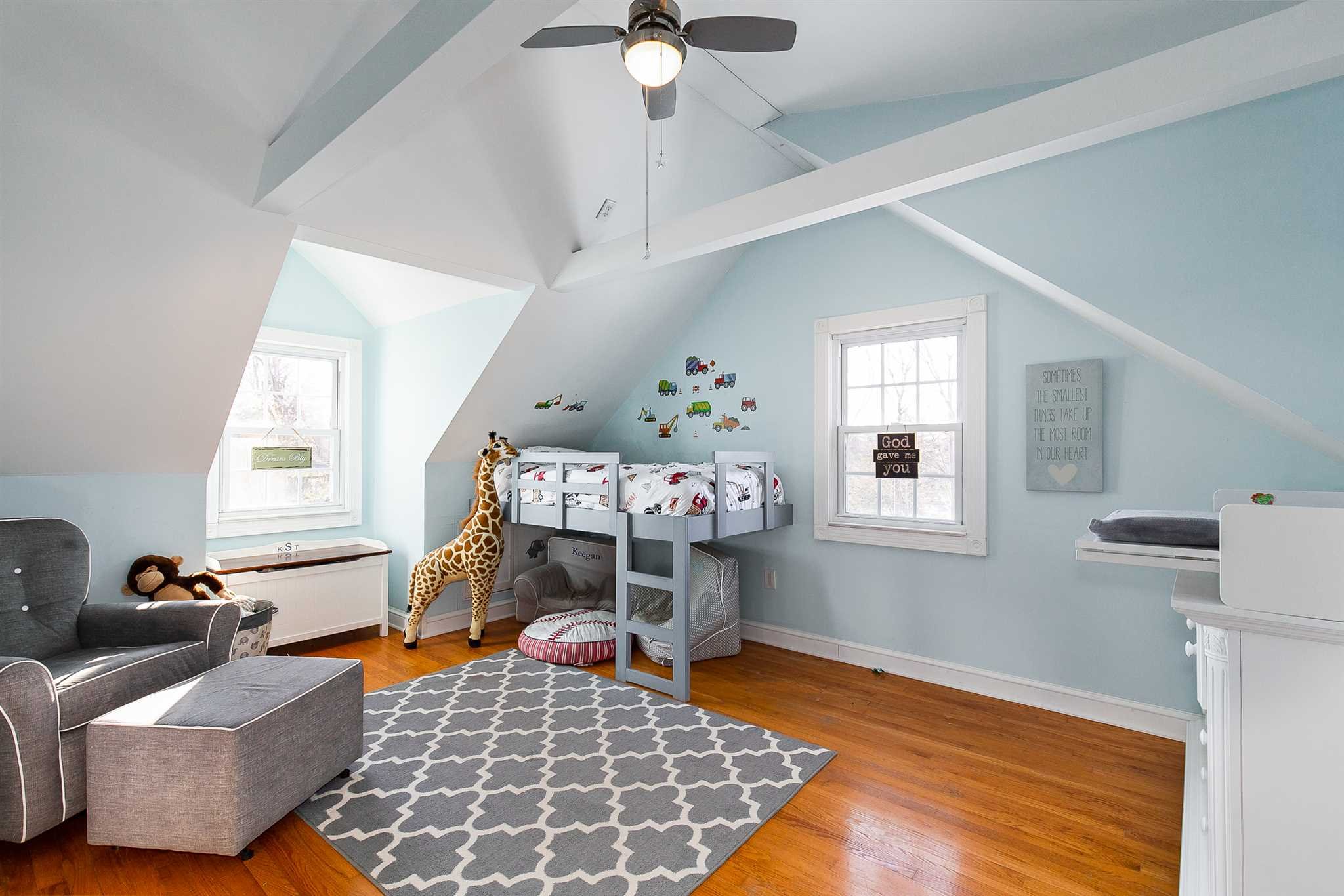 15 Meier Road LaGrange, NY 12603 - Photo 17 of 26 a bedroom with furniture and a chandelier