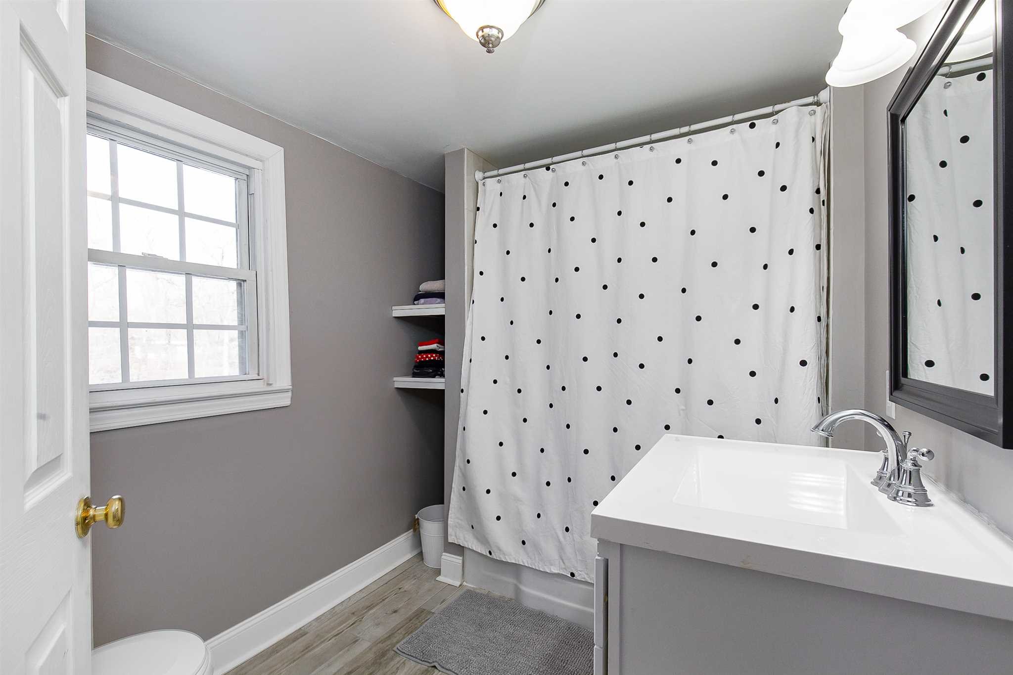 15 Meier Road LaGrange, NY 12603 - Photo 20 of 26 a bathroom with a sink a toilet and a shower