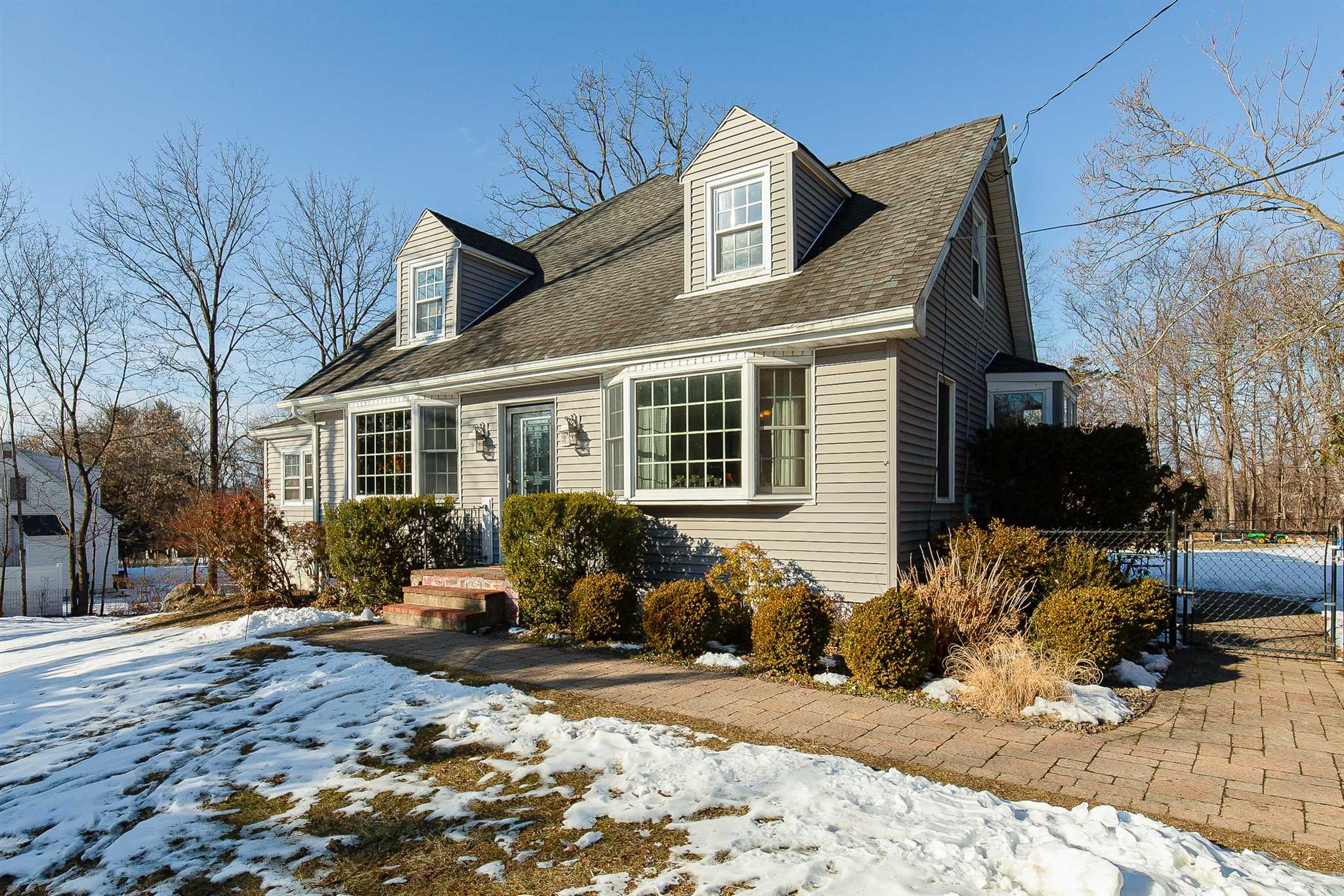 15 Meier Road LaGrange, NY 12603 - Photo 26 of 26 a front view of a house with a yard covered in snow