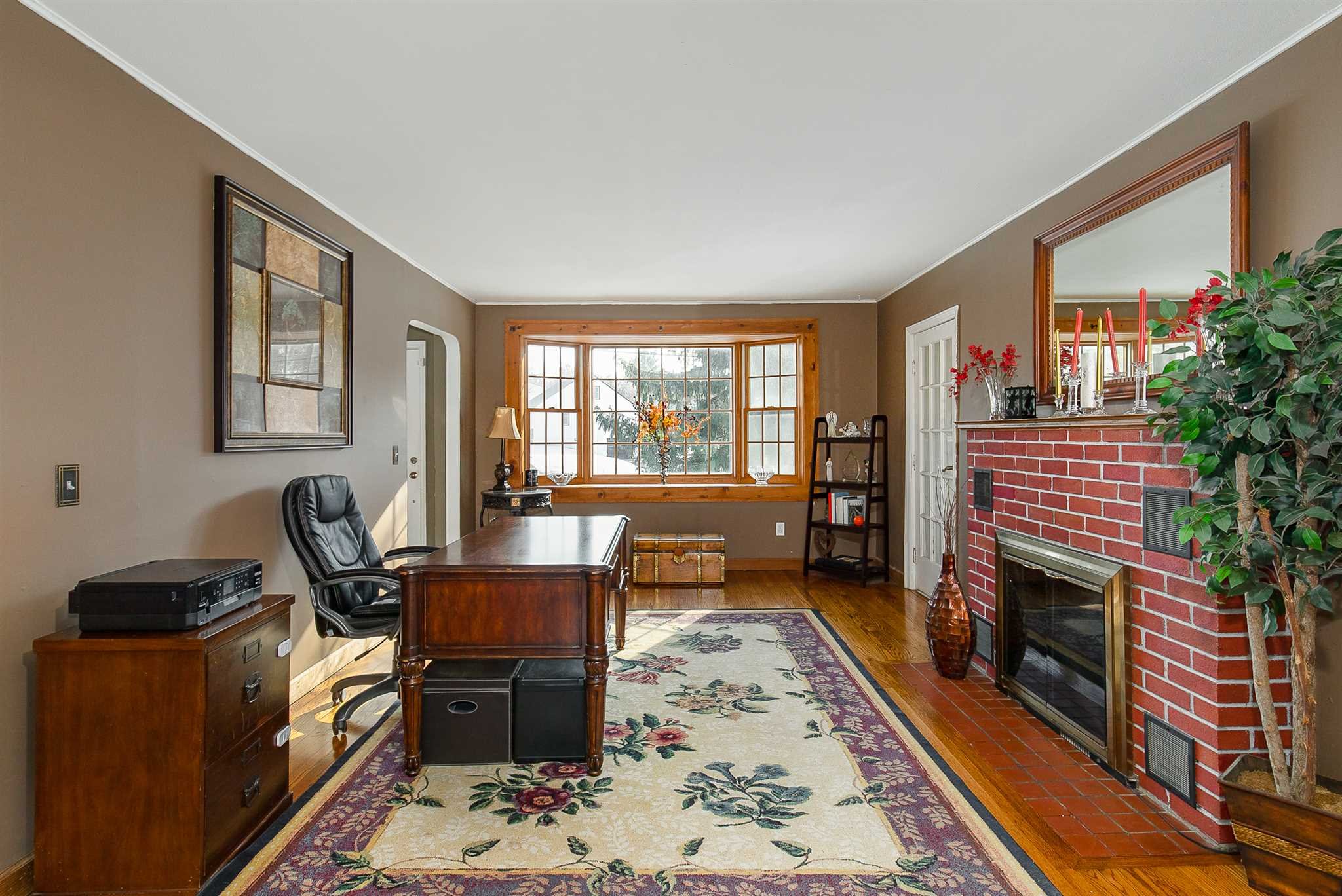 15 Meier Road LaGrange, NY 12603 - Photo 8 of 26 a living room with furniture a rug a fireplace and windows