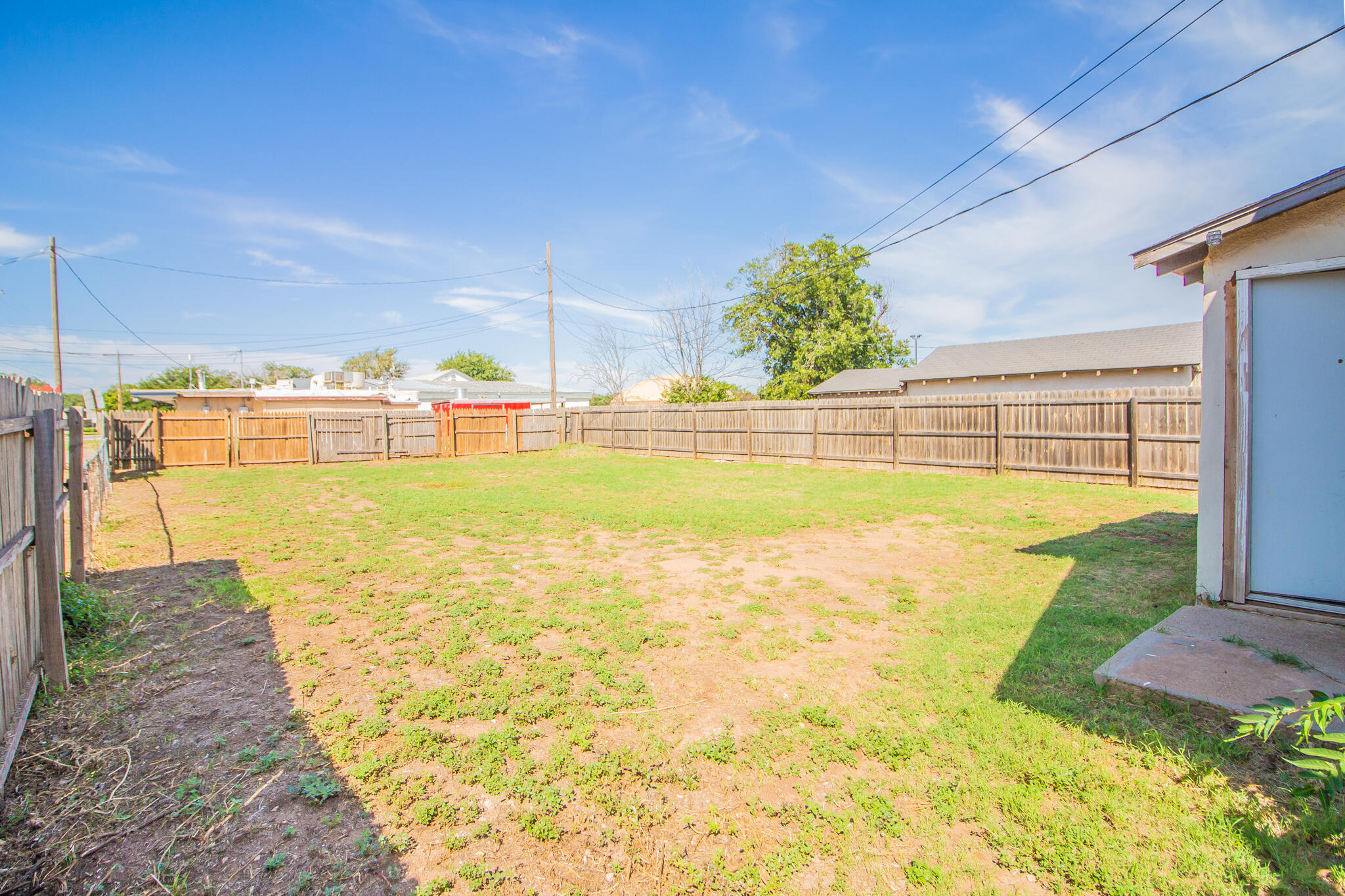 315 South 13th Street Slaton, TX 79364 - Photo 13 of 14 a view of a swimming pool with an outdoor seating