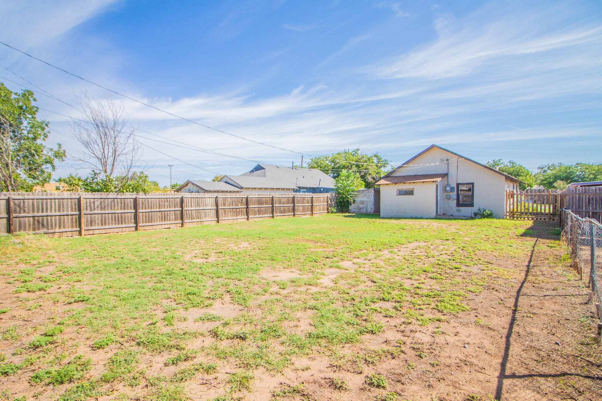 315 South 13th Street Slaton, TX 79364 - Photo 14 of 14 a house view with swimming pool in front of it