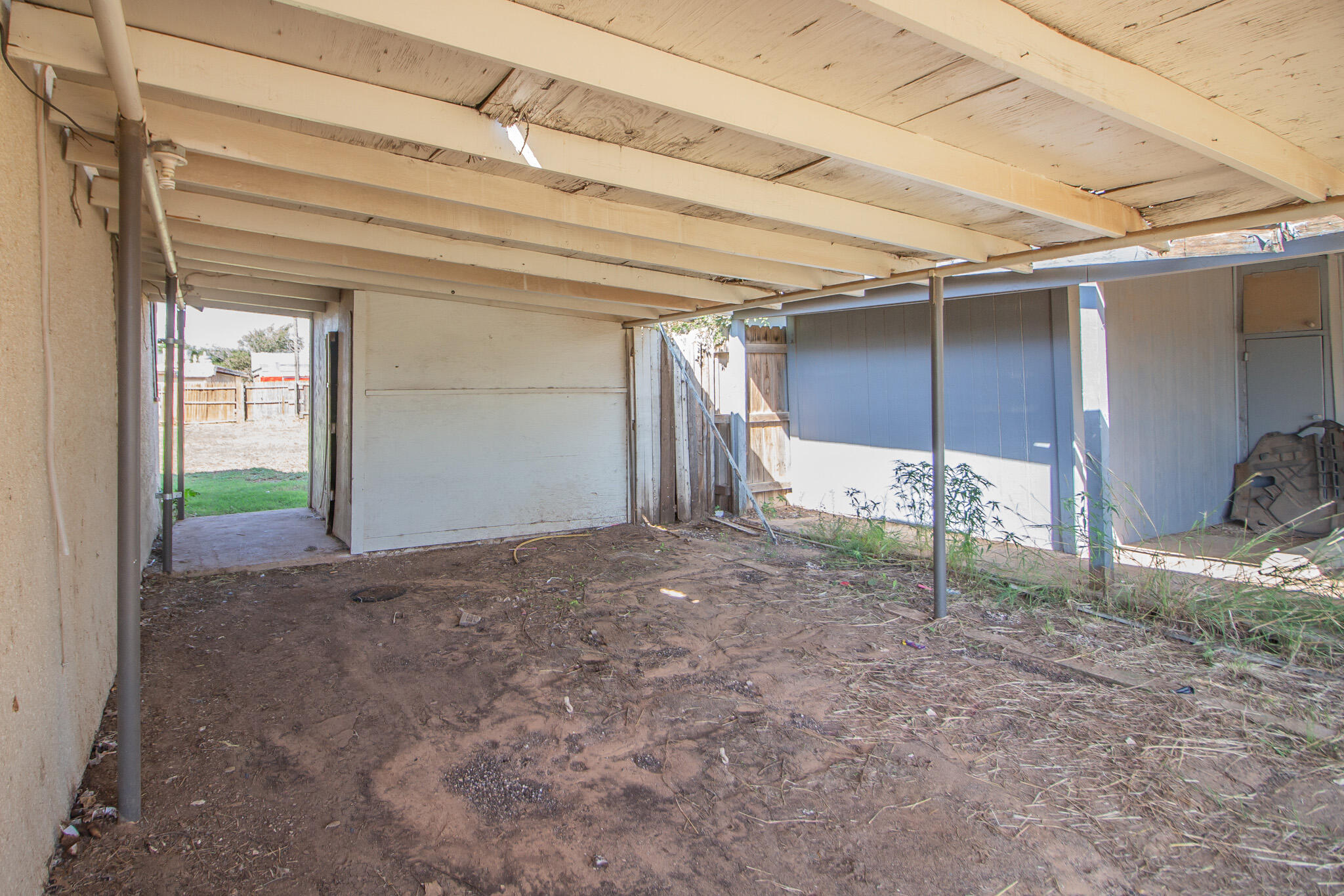 315 South 13th Street Slaton, TX 79364 - Photo 3 of 14 a view of an empty room