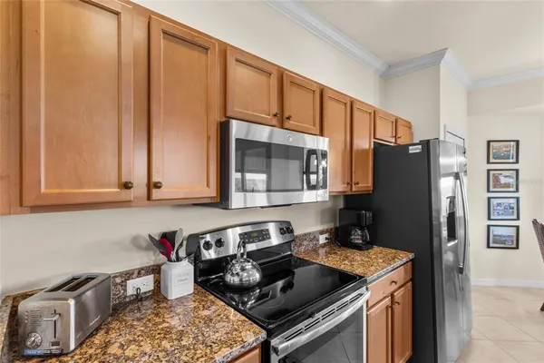 a kitchen with a stove and a sink