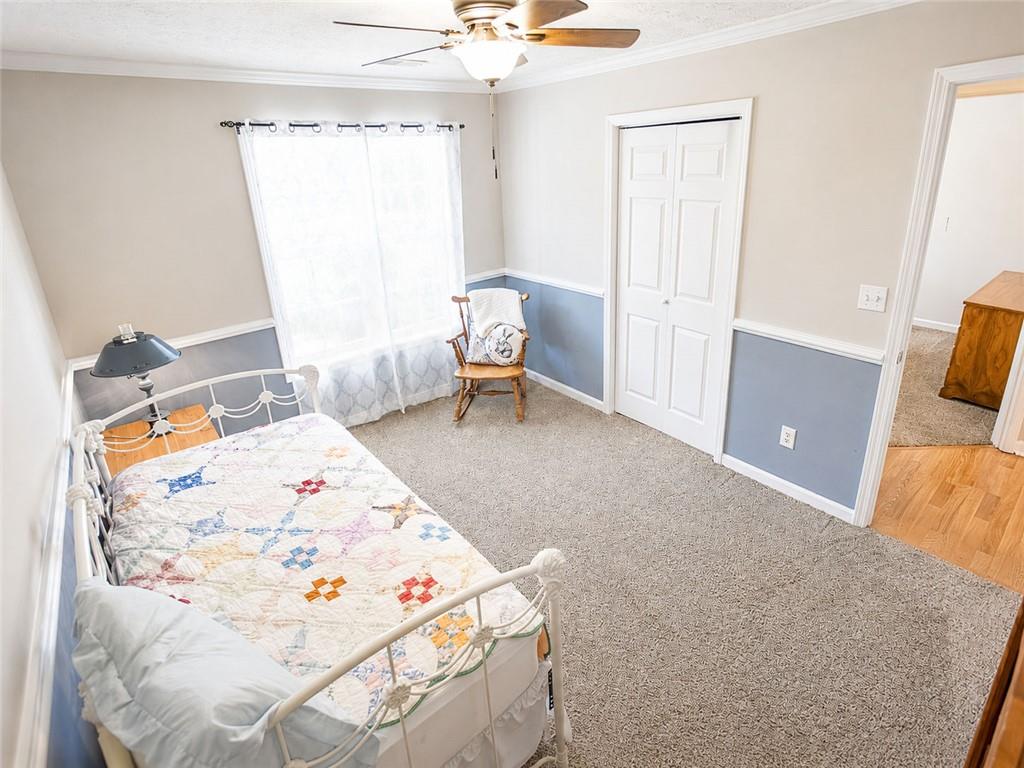 205 Richmond Hill Road Monroe, GA 30655 - Photo 13 of 15 a living room with furniture and a table