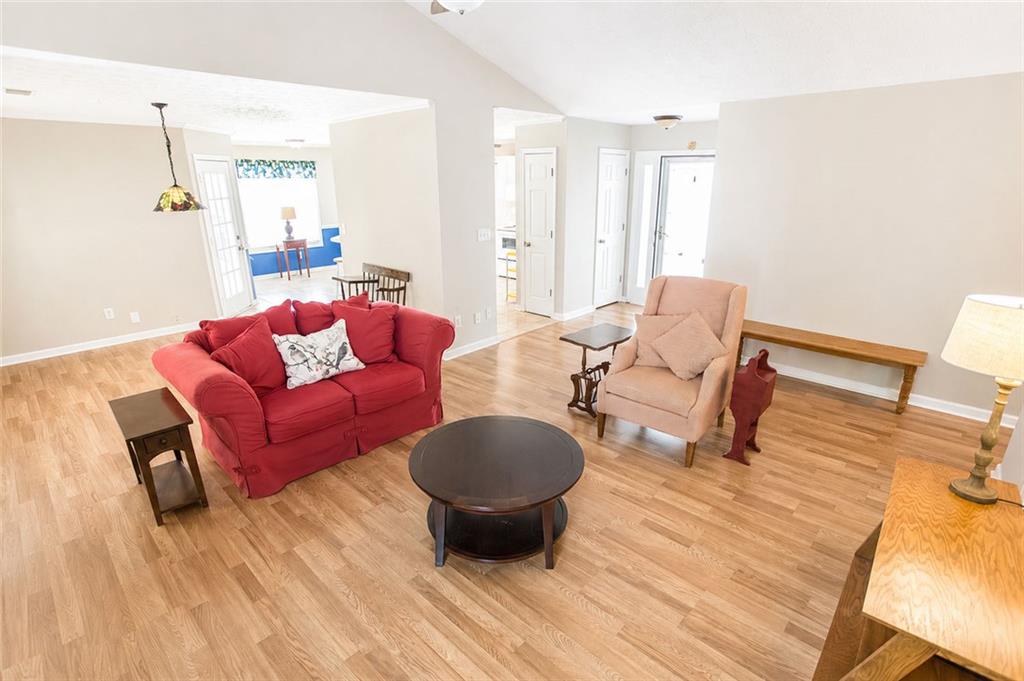 205 Richmond Hill Road Monroe, GA 30655 - Photo 6 of 15 a living room with furniture and a wooden floor