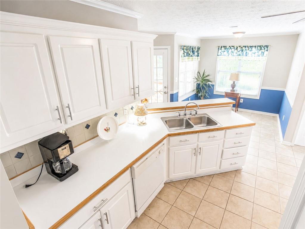 205 Richmond Hill Road Monroe, GA 30655 - Photo 7 of 15 a spacious bathroom with a sink double vanity and window