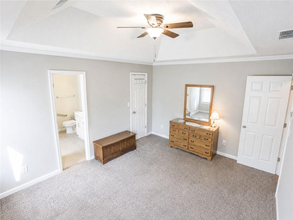 205 Richmond Hill Road Monroe, GA 30655 - Photo 10 of 15 a living room with furniture and a chandelier