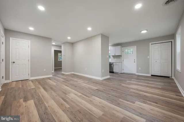 a view of a kitchen with a sink cabinets and a window