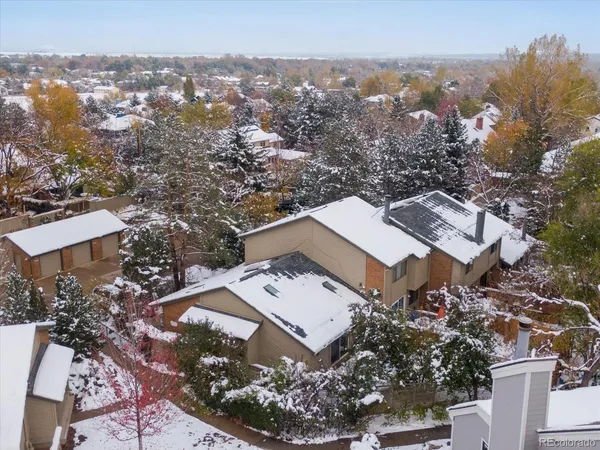 an aerial view of a house with a outdoor space