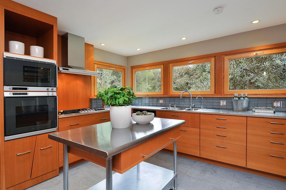 214 Swett Road Woodside, CA 94062 - Photo 15 of 67 a kitchen with stainless steel appliances granite countertop a stove a sink and a refrigerator
