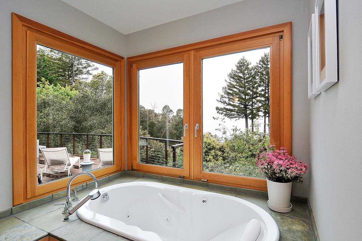 214 Swett Road Woodside, CA 94062 - Photo 27 of 67 a bath tub sitting in front of a window