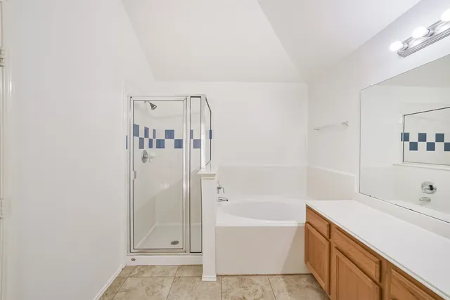 a bathroom with a bathtub and a sink