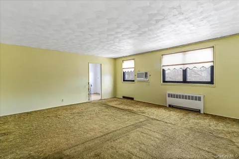 $308,000 | 58-33 246th Crescent, Unit C14 UPPER | Douglaston