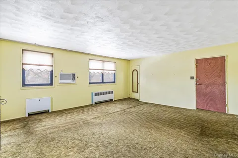 $308,000 | 58-33 246th Crescent, Unit C14 UPPER | Douglaston