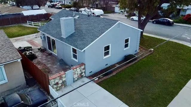 an aerial view of a house having yard