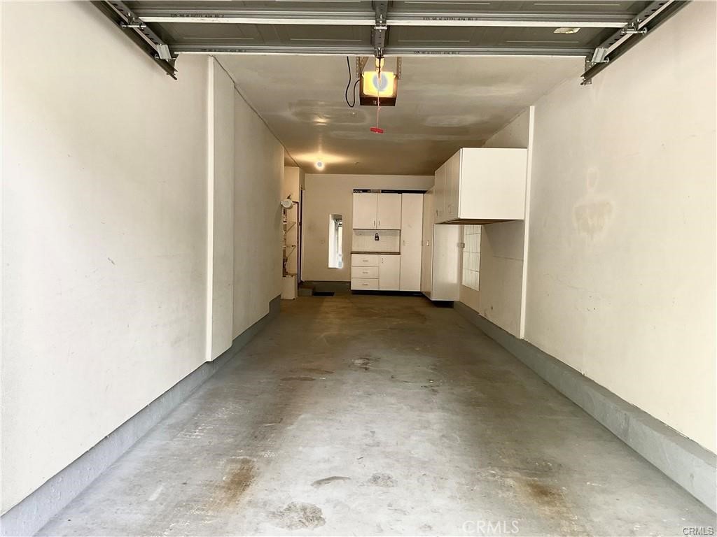 511 Birch Grove Irvine, CA 92618 - Photo 14 of 15 a view of a hallway with wooden floor