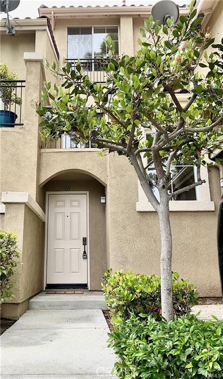 511 Birch Grove Irvine, CA 92618 - Photo 15 of 15 a front view of a house with garden