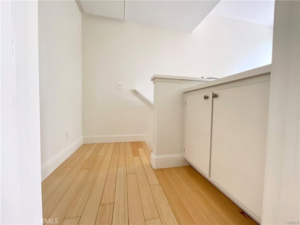 511 Birch Grove Irvine, CA 92618 - Photo 7 of 15 a view of a room with wooden floor