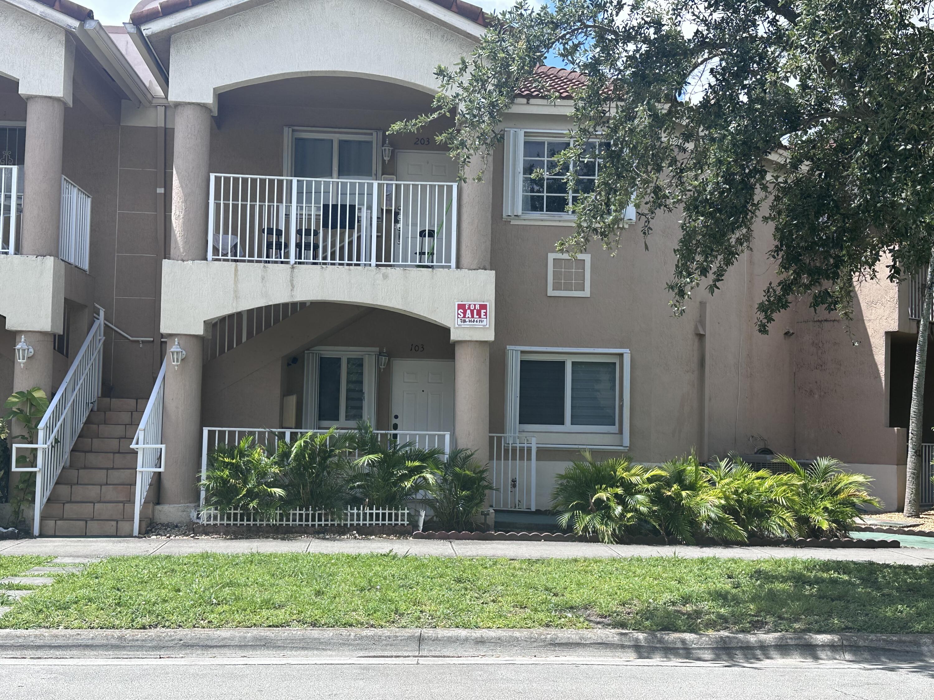 300 East 4th Street, Unit 103 Hialeah, FL 33010 - Photo 1 of 27 Front