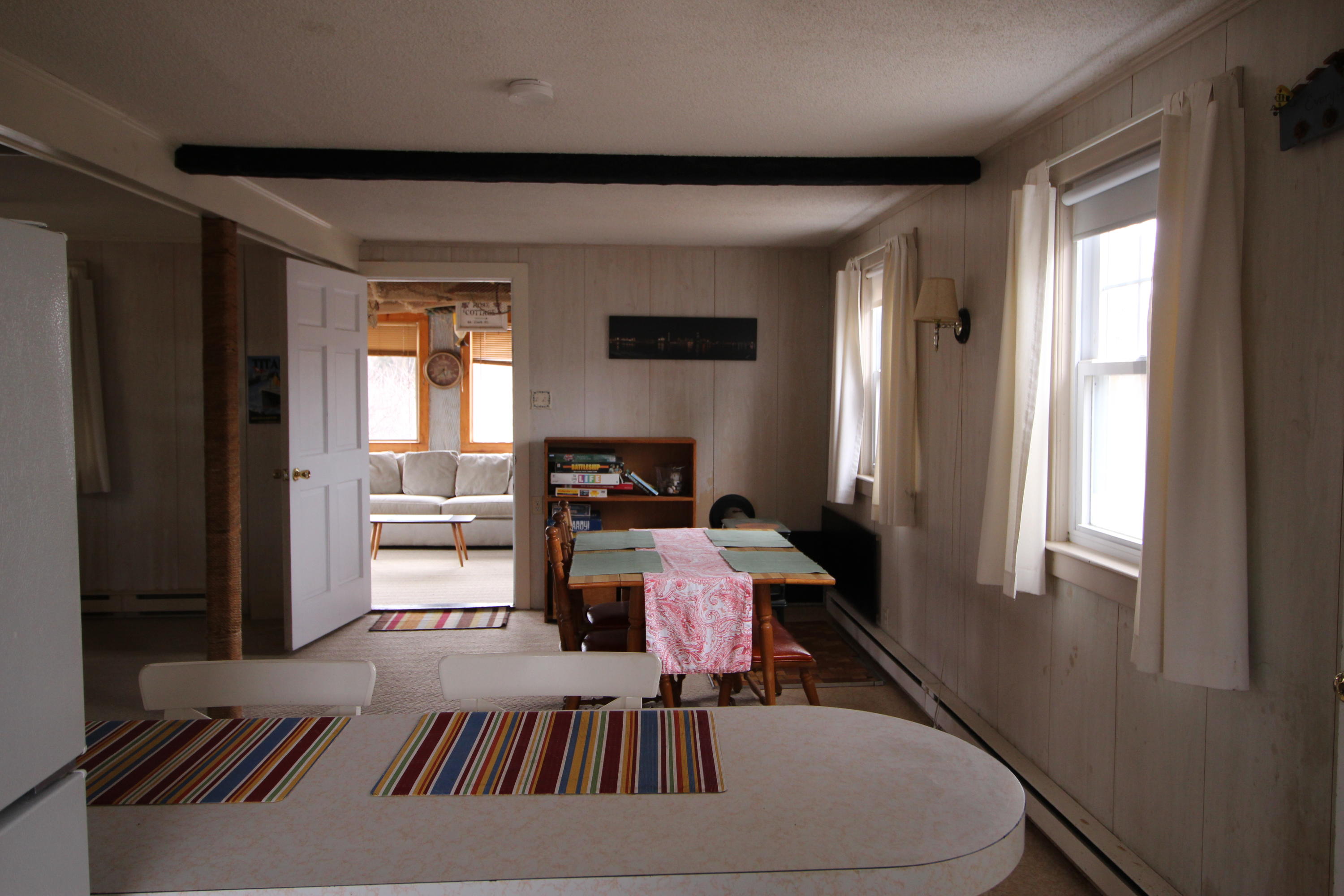 21 Knowles Heights Road Truro, MA 02666 - Photo 15 of 38 a bedroom with a bed and wooden floor