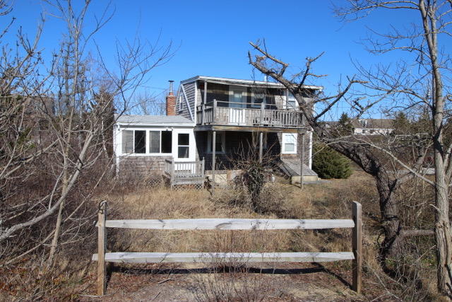 21 Knowles Heights Road Truro, MA 02666 - Photo 4 of 38 a front view of a house with trees