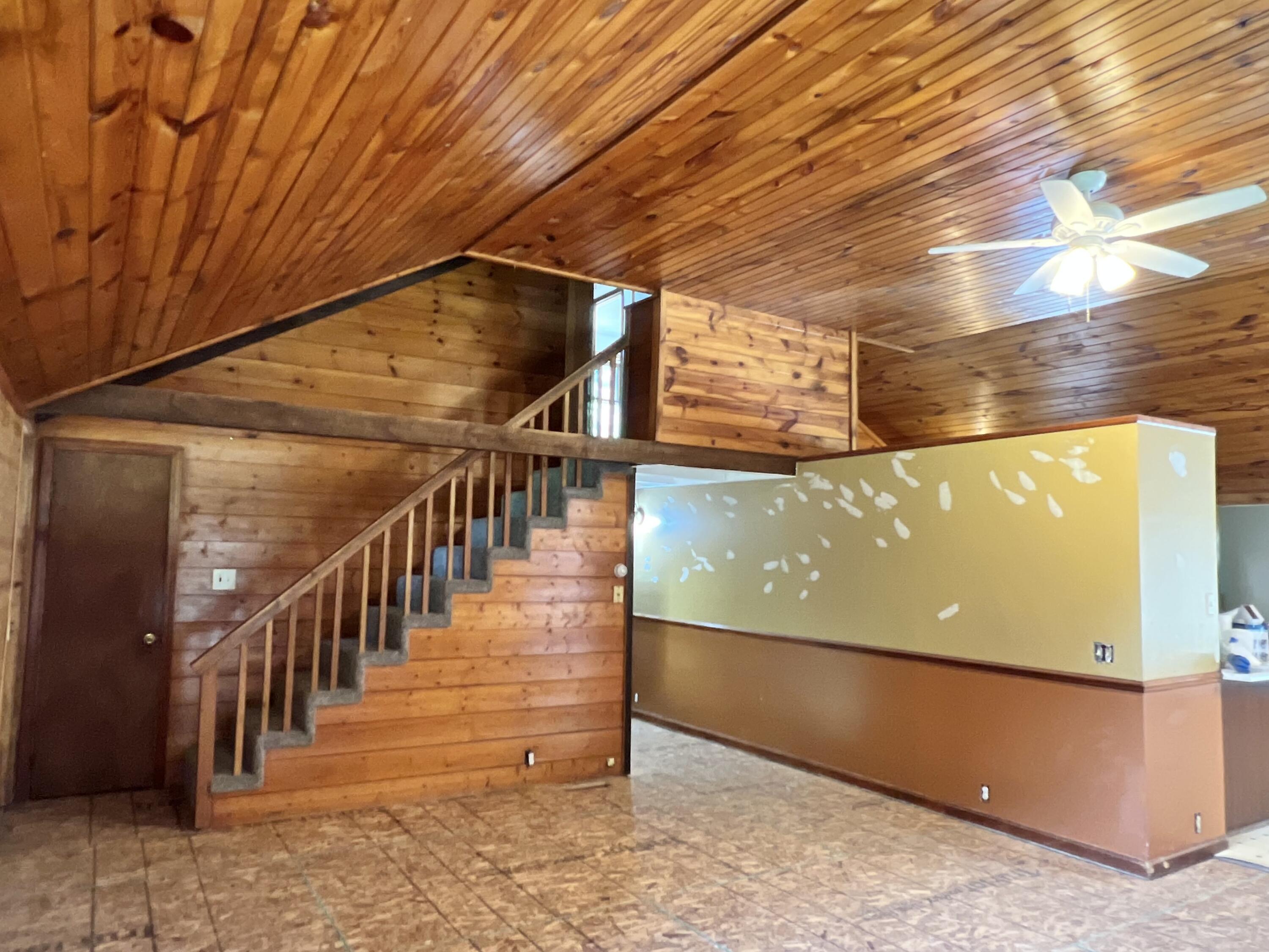 7291 South Whiteville Road Shepherd, MI 48883 - Photo 24 of 46 Living room towards hallway