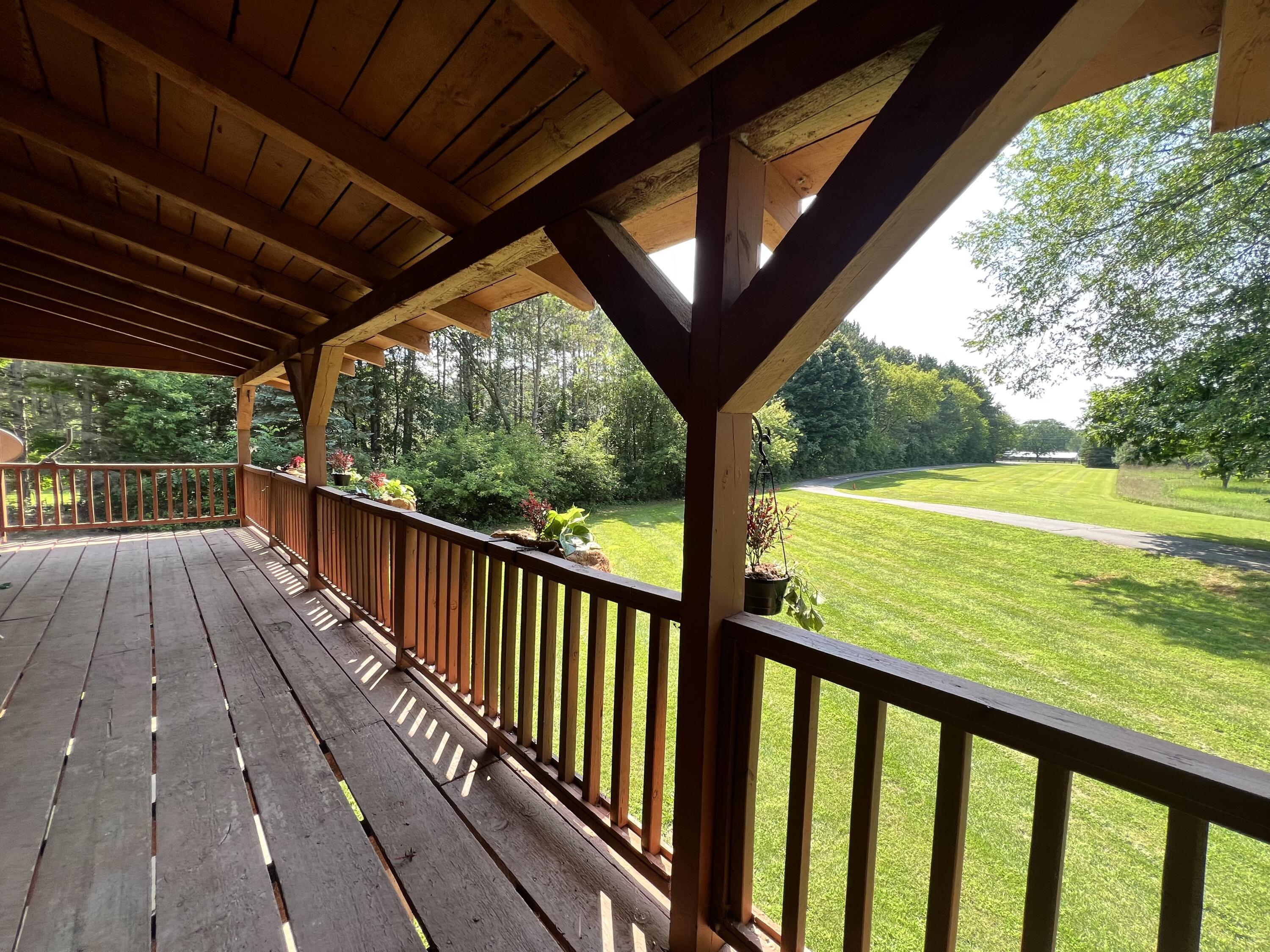 7291 South Whiteville Road Shepherd, MI 48883 - Photo 8 of 46 Front deck
