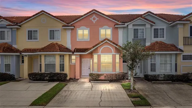 a front view of a house with yard