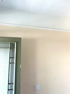 a view of a swimming pool and an outdoor seating