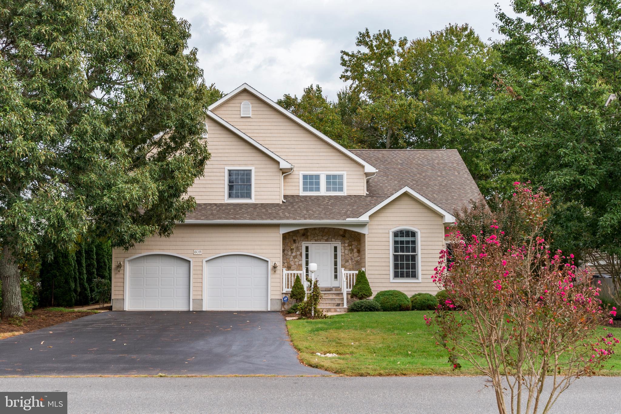 609 Bethany Loop Bethany Beach, DE 19930 - Photo 2 of 41 Front elevation with stone entry and 2 car garage