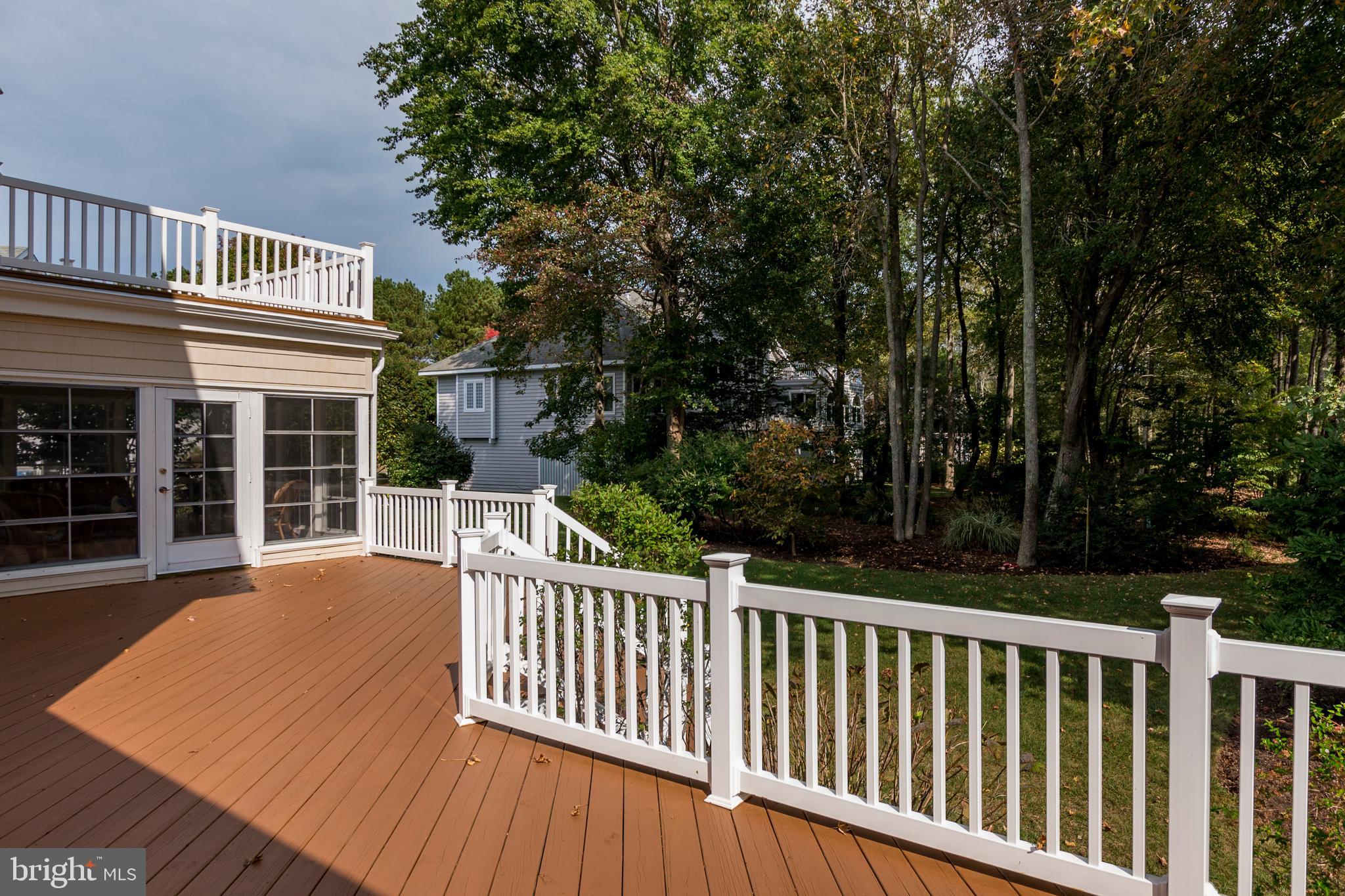 609 Bethany Loop Bethany Beach, DE 19930 - Photo 14 of 41 Deck looking towards sunroom