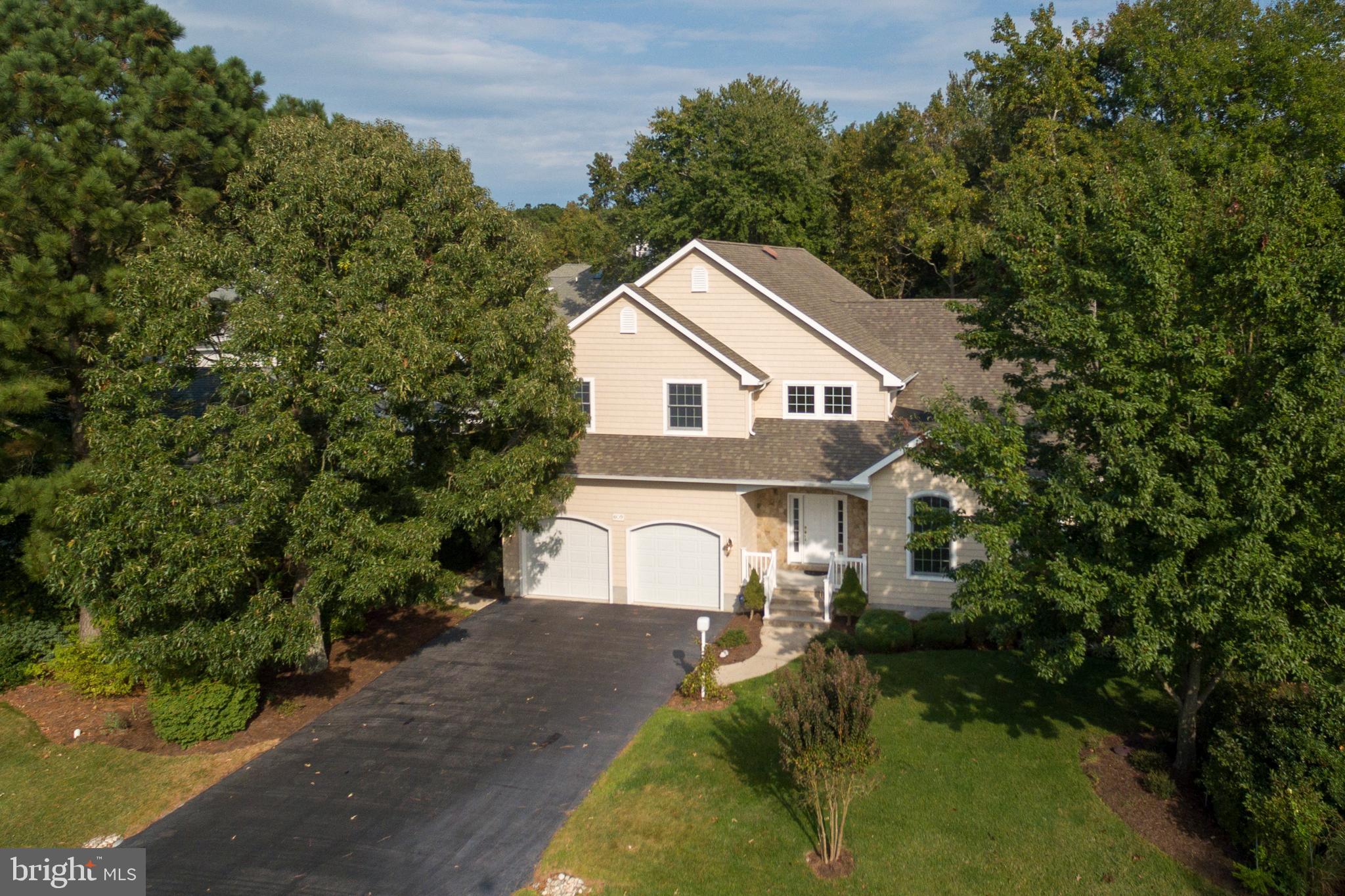 609 Bethany Loop Bethany Beach, DE 19930 - Photo 3 of 41 Ample parking in drive for family and guests
