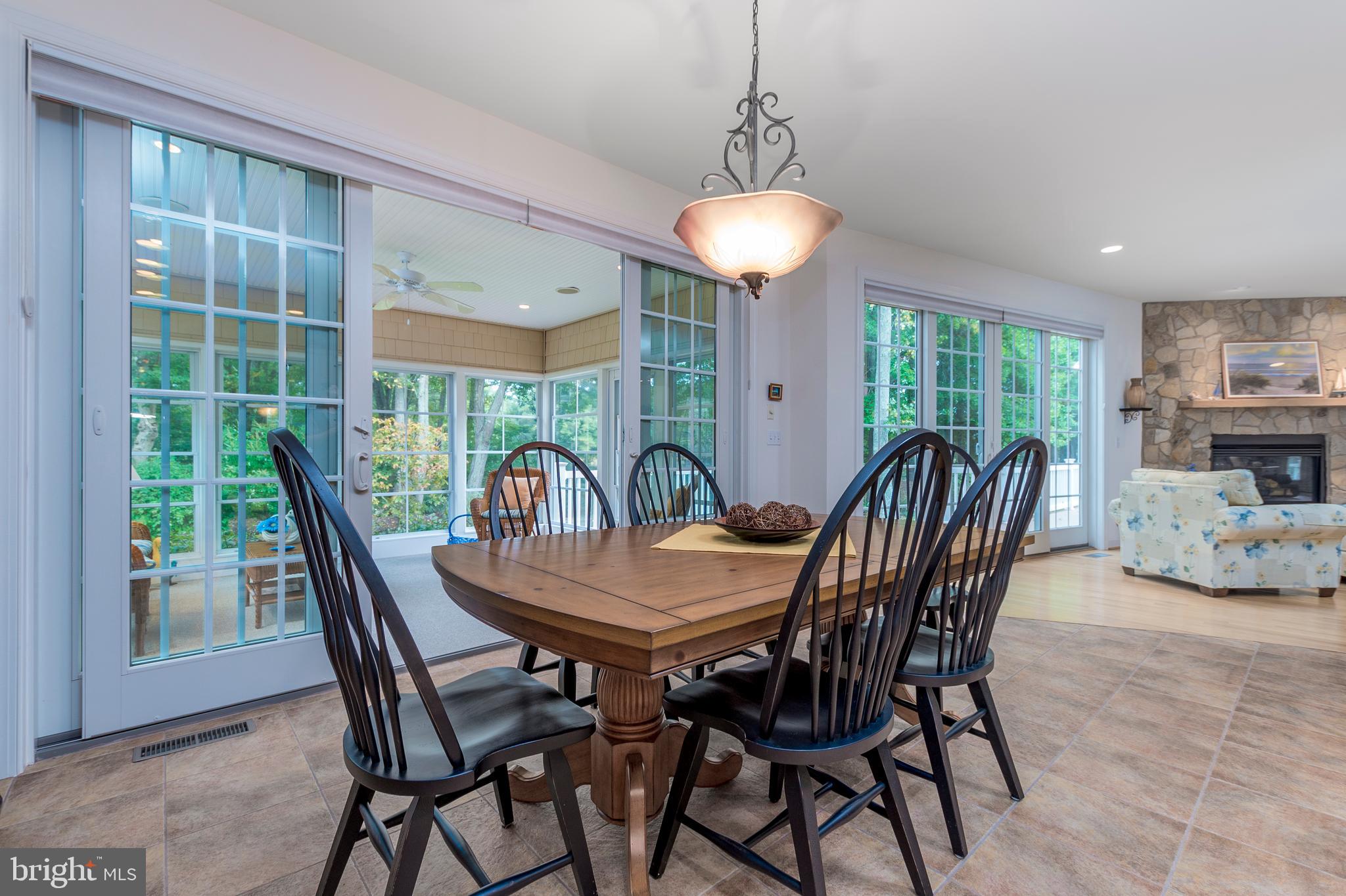 609 Bethany Loop Bethany Beach, DE 19930 - Photo 25 of 41 Dining area opens to sun porch