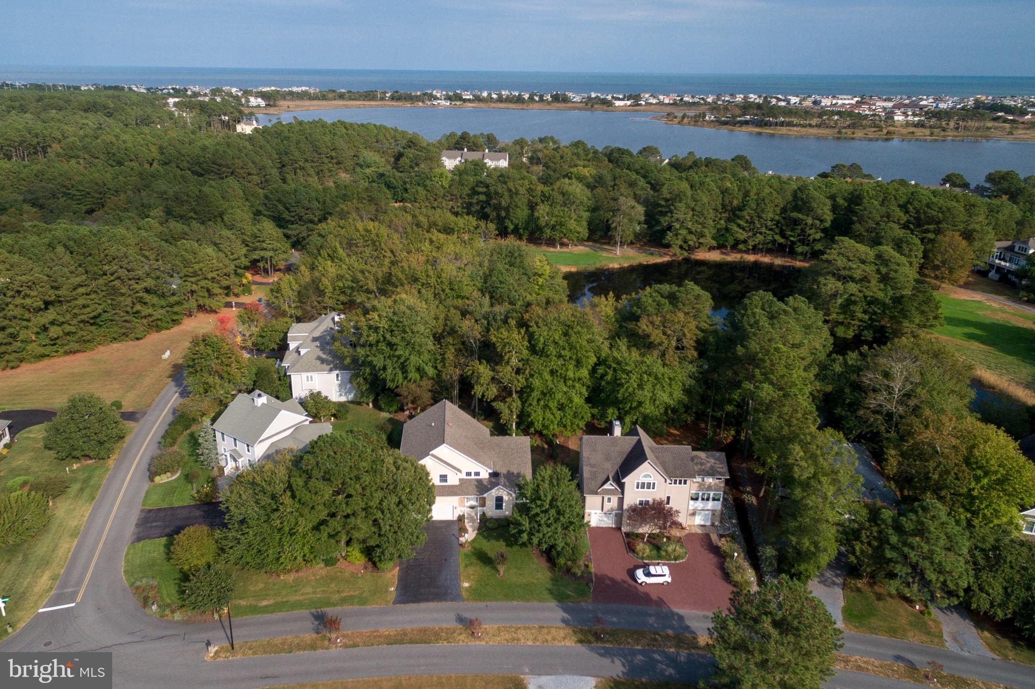 609 Bethany Loop Bethany Beach, DE 19930 - Photo 4 of 41 Nestled in among the trees