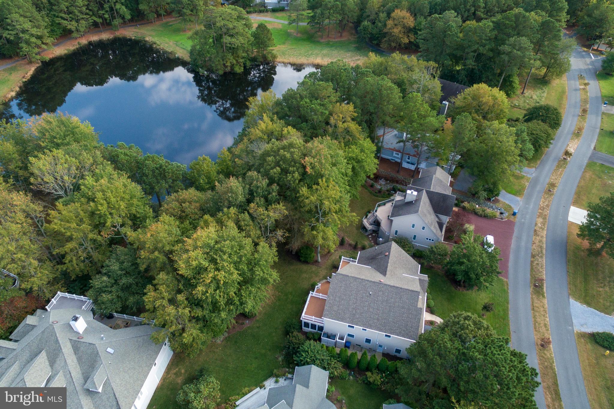 609 Bethany Loop Bethany Beach, DE 19930 - Photo 5 of 41 Lovely views of the pond on the 16th hole