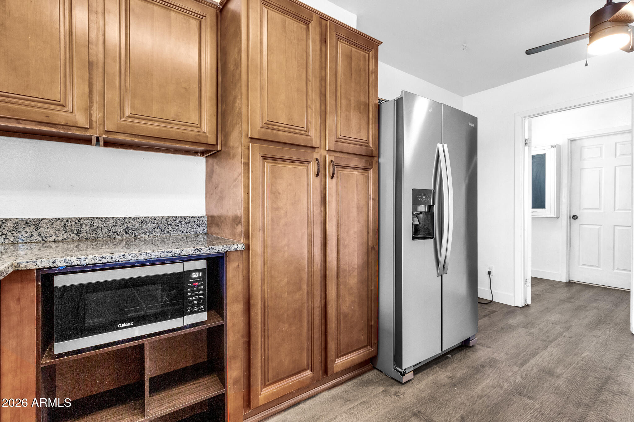 2024 East Rice Drive Tempe, AZ 85283 - Photo 16 of 39 a view of a kitchen with refrigerator and cabinet