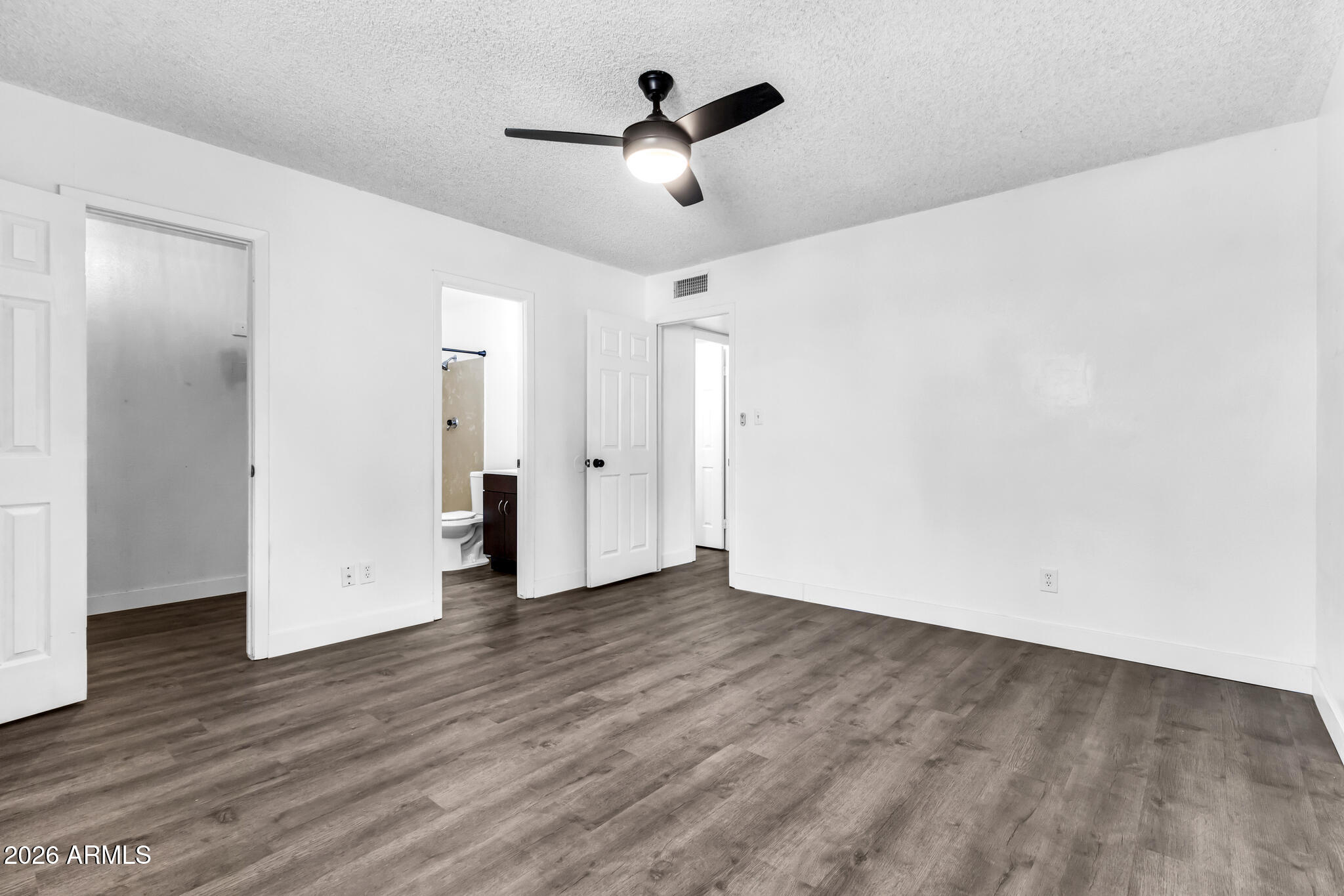 2024 East Rice Drive Tempe, AZ 85283 - Photo 21 of 39 an empty room with wooden floor and ceiling fan