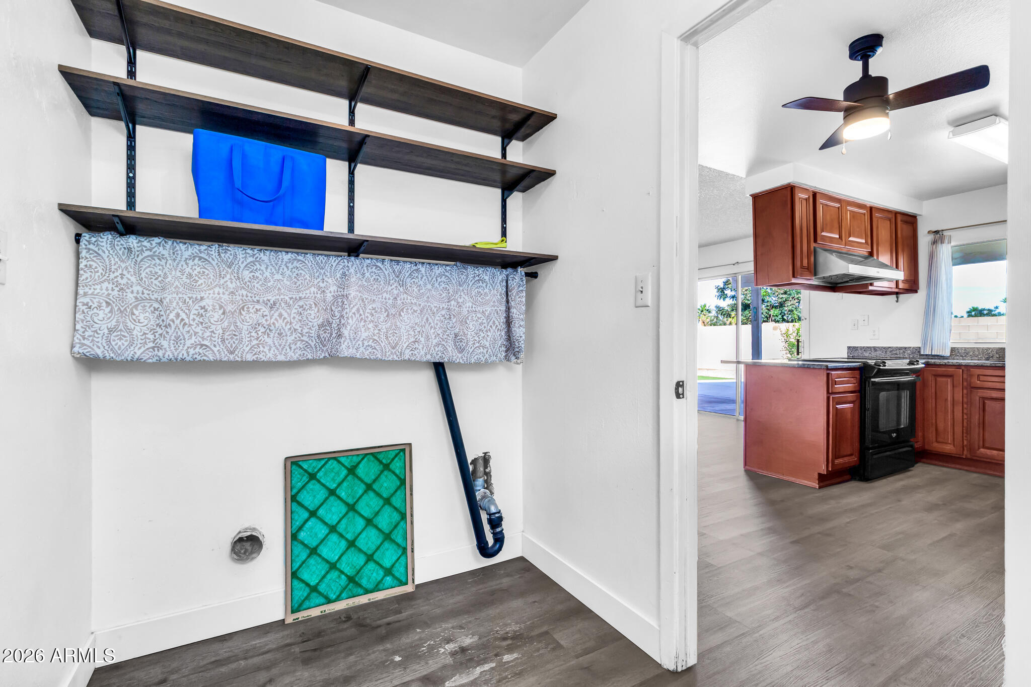 2024 East Rice Drive Tempe, AZ 85283 - Photo 30 of 39 a view of kitchen with furniture and a ceiling fan