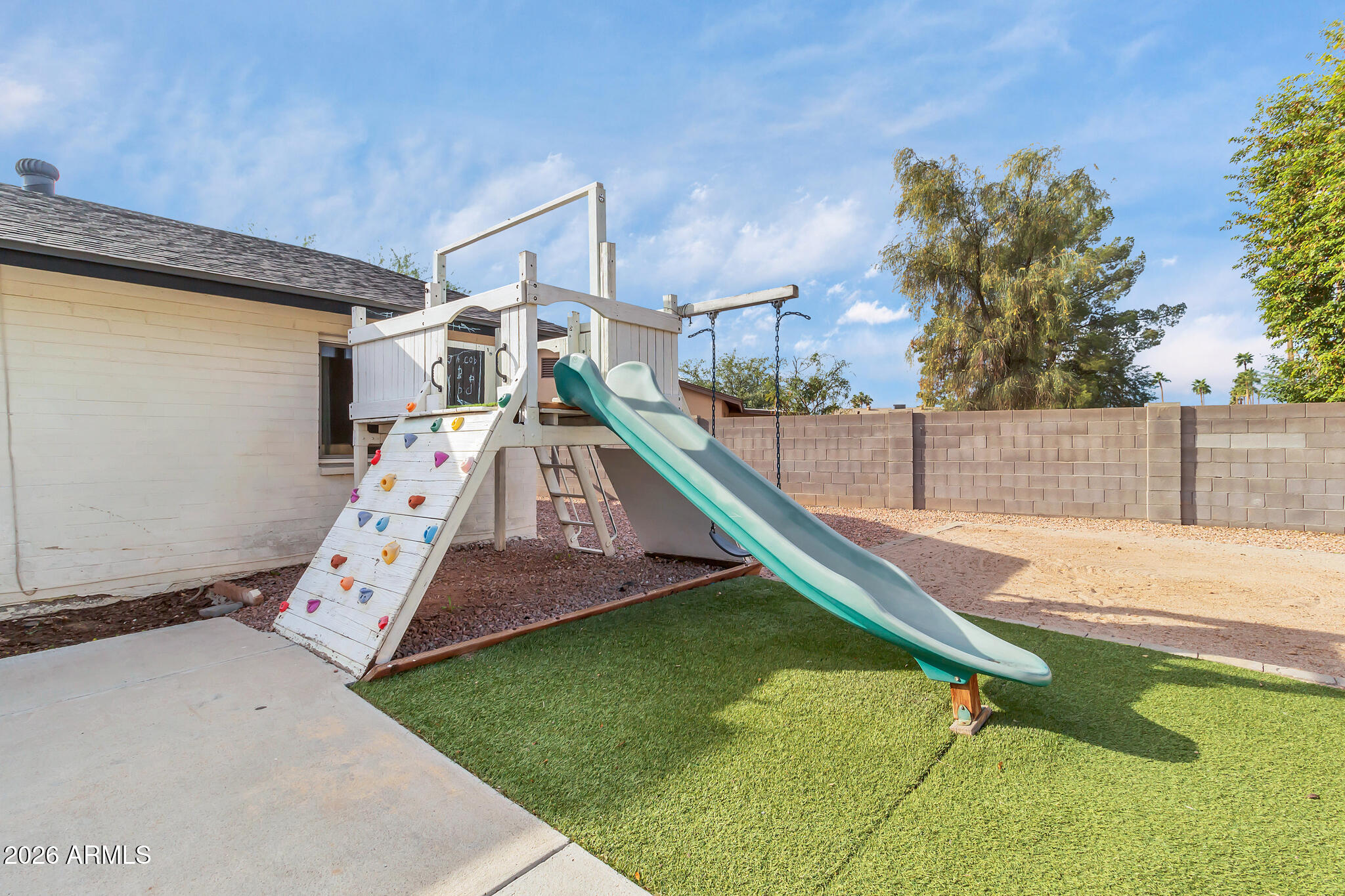 2024 East Rice Drive Tempe, AZ 85283 - Photo 32 of 39 a view of a backyard with hardwood