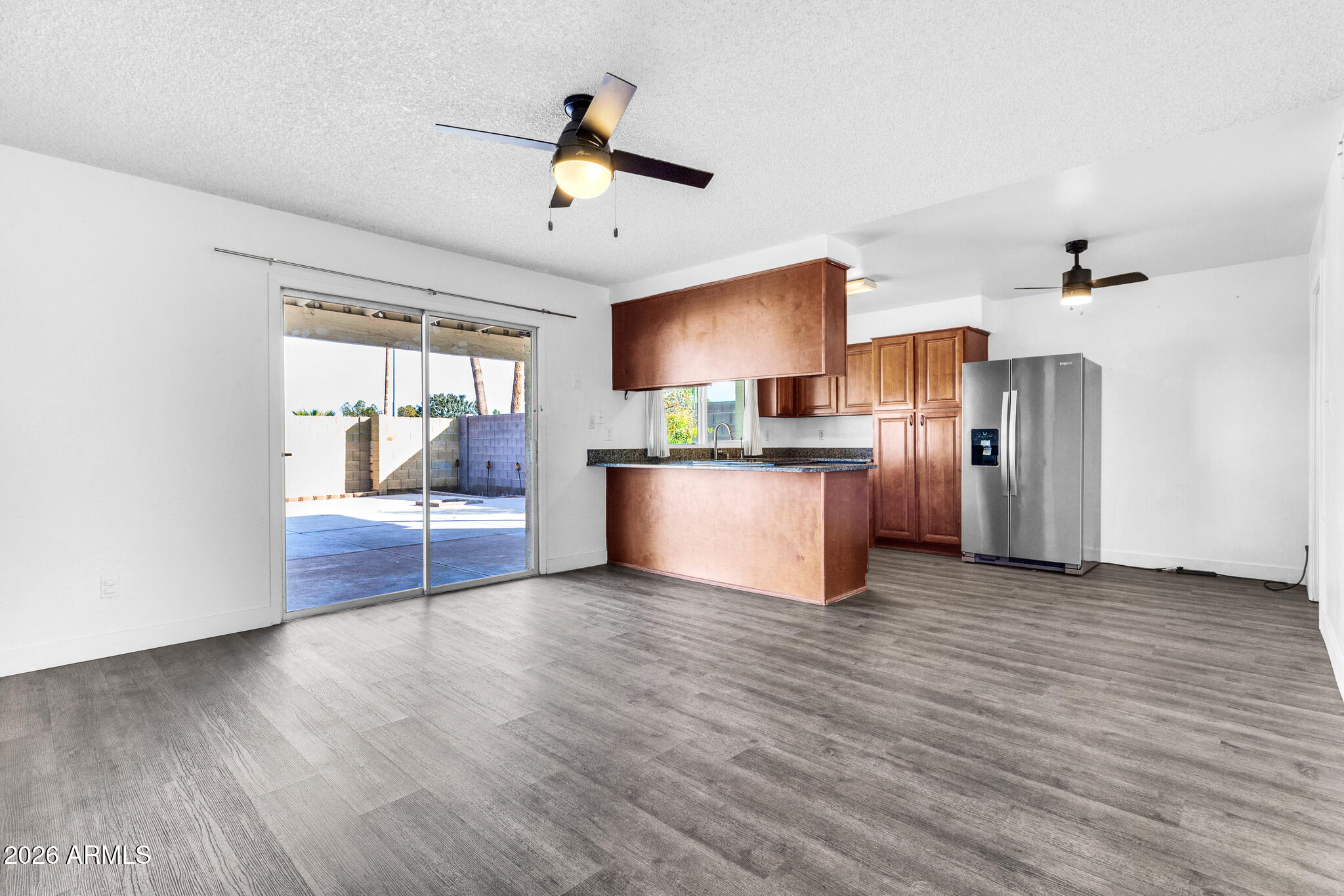 2024 East Rice Drive Tempe, AZ 85283 - Photo 9 of 39 a view of a kitchen with a sink wooden floor and a window