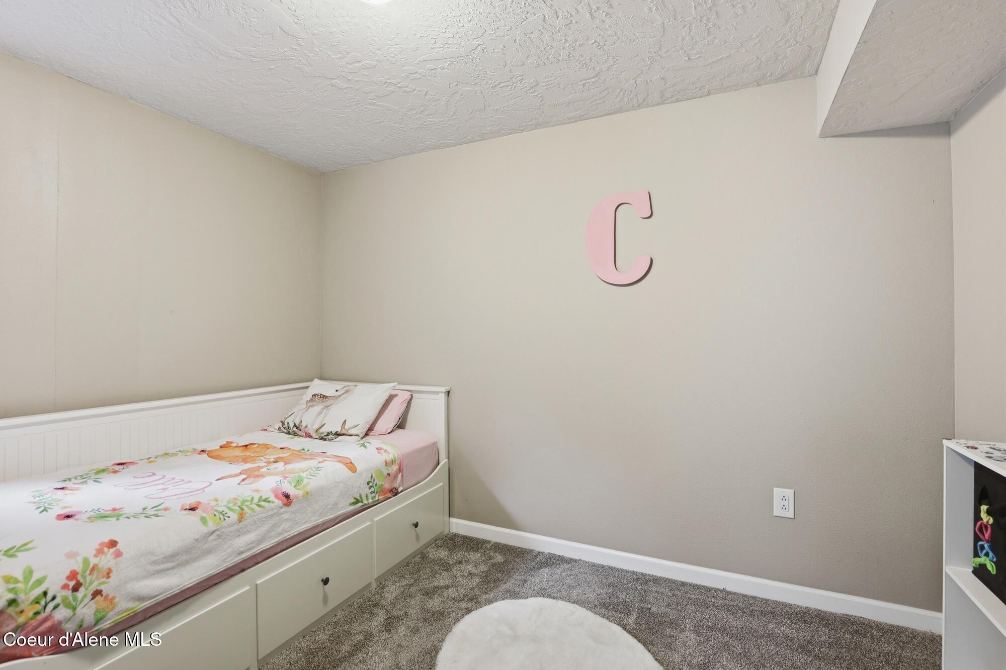 15720 North Ridgeway Drive Hayden, ID 83835 - Photo 28 of 40 Basement Bedroom