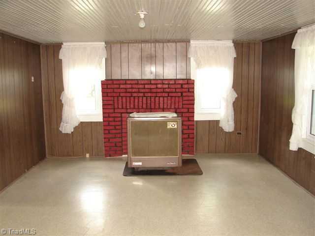 1923 Summey Town Road Trinity, NC 27370 - Photo 8 of 16 Living Room. with wood heater with blower
