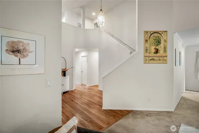 a view of entryway with a painting on the wall